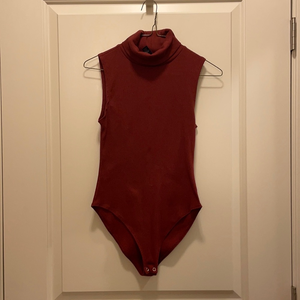 Red turtleneck bodysuit